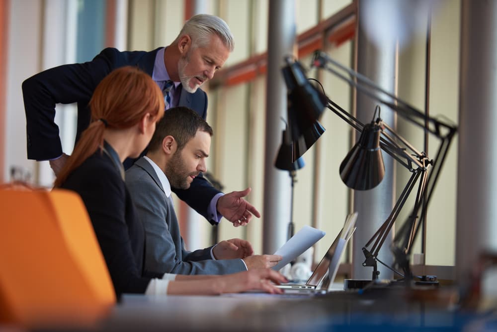 business-people-group-with-young-adults-and-senior-on-meeting-at-modern-bright-office-interior