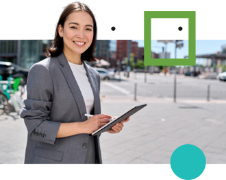 A smiling HR consultant writing notes on her tablet.